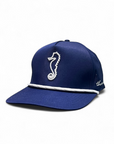 Navy blue cap with a white seahorse emblem on a white background