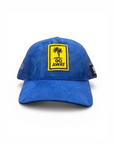 Blue cap with a yellow and black graphic on a white background